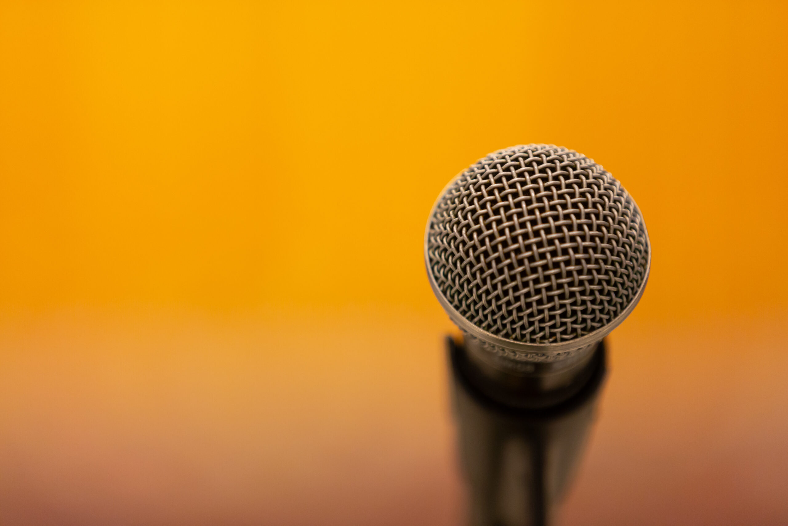 microphone on a yellow background